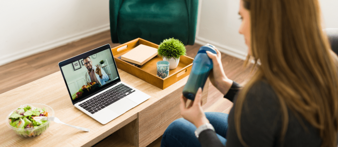 Young woman on a video call with a nutritionist-min-1